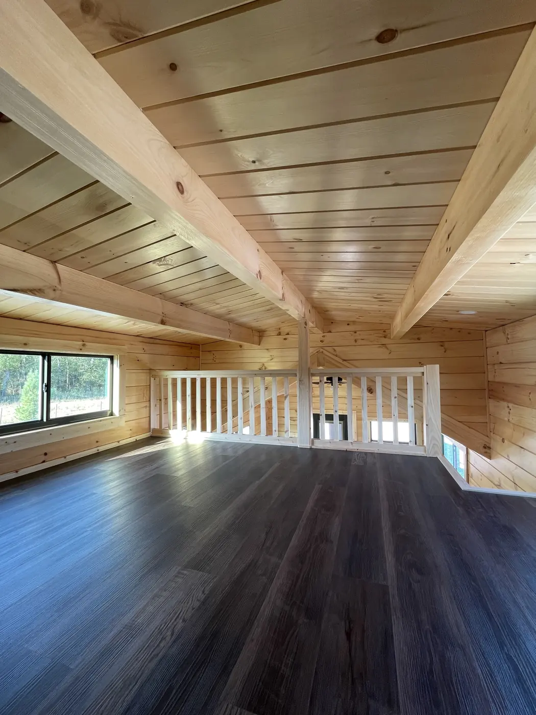 Solid pine ceiling and timber beams over the loft